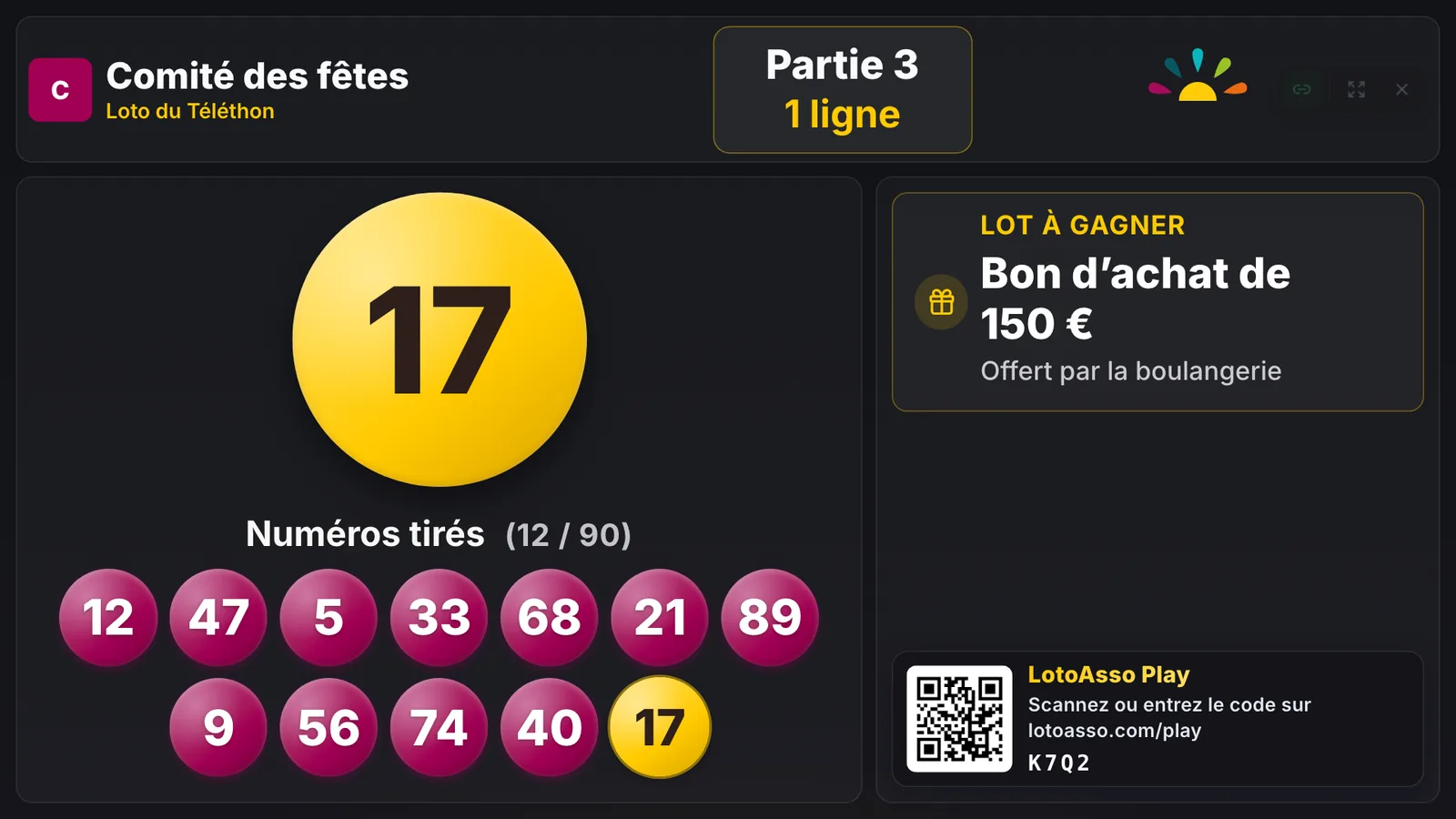 Écran de projection LotoAsso Live avec le thème Téléthon : numéros prune, dernier numéro sur une boule jaune et soleil aux cinq rayons